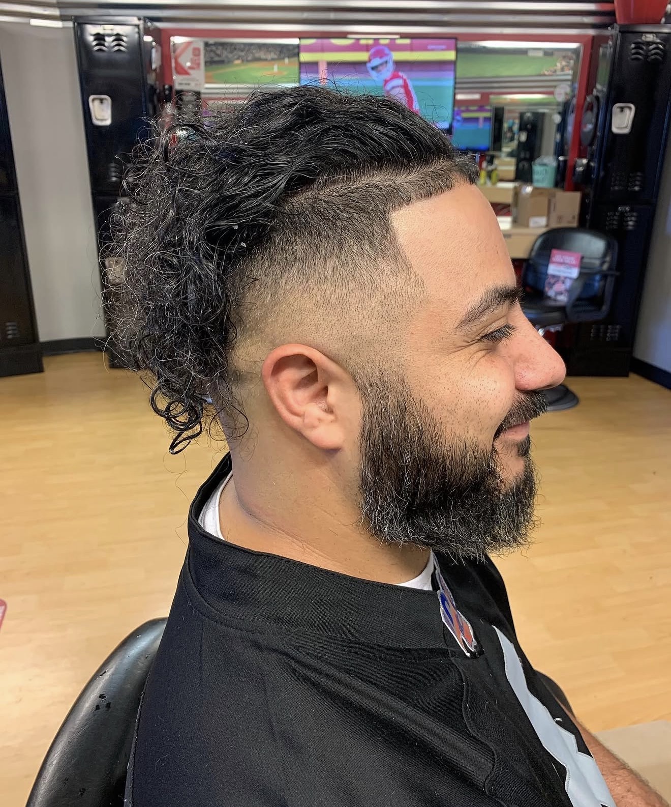 Mullet fade with sharp beard lineup by Kay