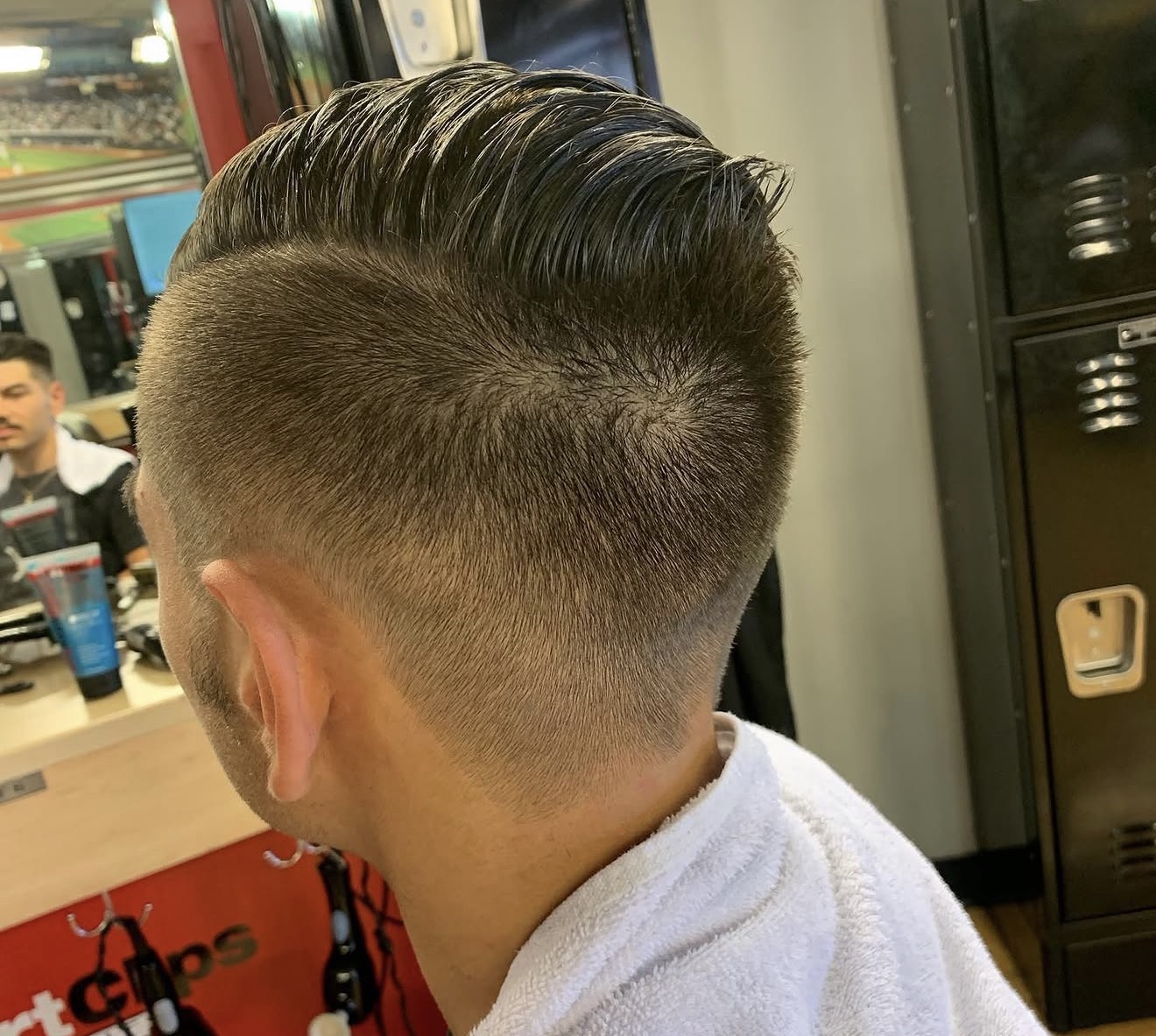 Pompadour with tight skin fade by Kay