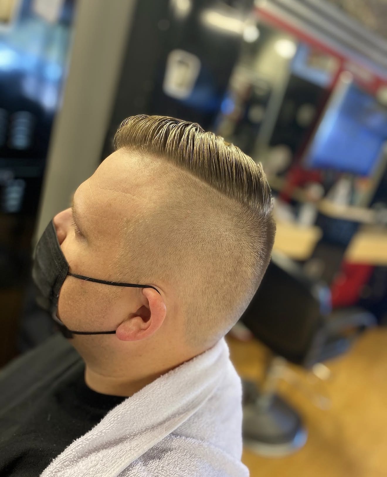 Side part comb-over with skin fade by Kay